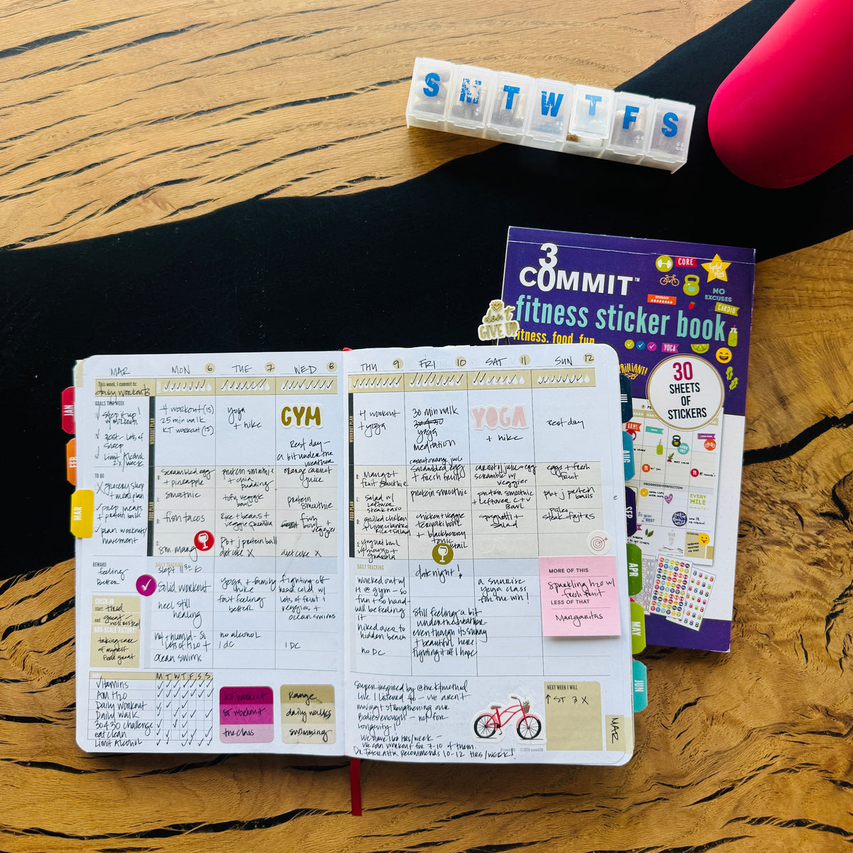 A Fitness Journal with the Fitness Sticker Book and dumbbells